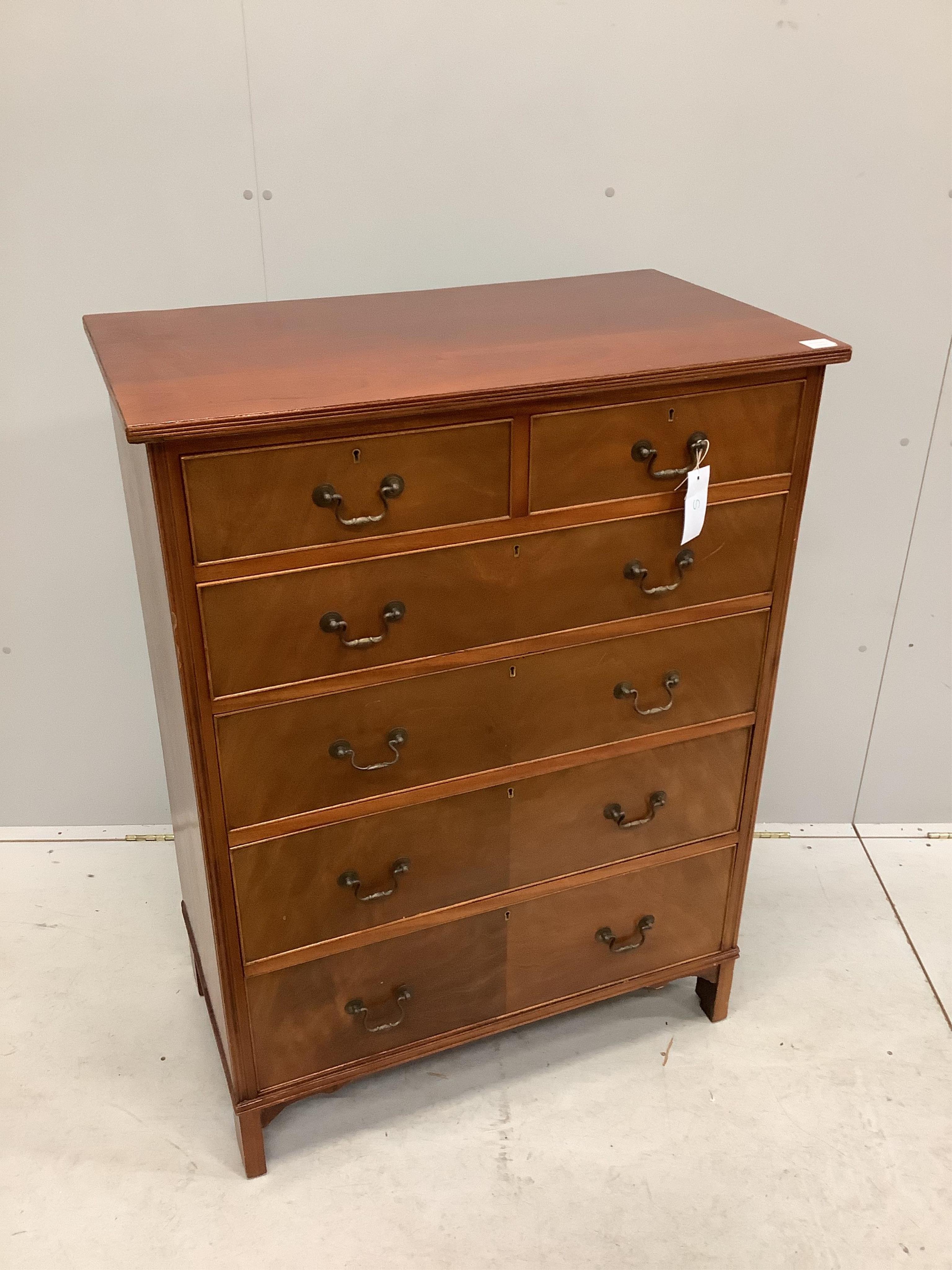 A George III style mahogany chest of two short and four long drawers, veneered fronts with brass loop handles, on bracket feet, width 91cm, depth 52cm, height 122cm. Condition - fair